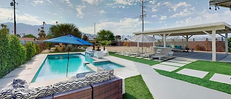 Gorgeous pool and spa with mountain view, multiple seating area options