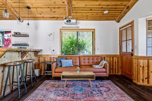 Cozy place to sit and watch movies. Lots of natural light throughout the cabin.