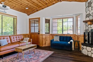 The comfy blue sofa chair converts into a twin bed sleeper.