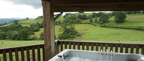 Private hot tub suite - shower/changing room through to a covered decking area