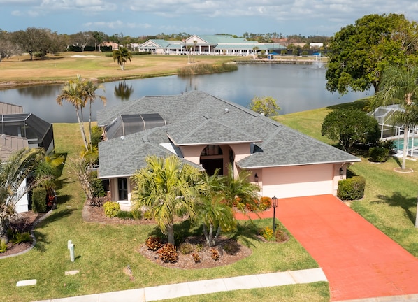 Located directly on golf course and lake.