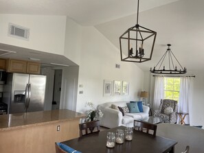 Dinning area & Full kitchen with serving & cookware 