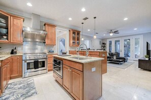 Spacious Chefs kitchen with all of your cooking needs!
