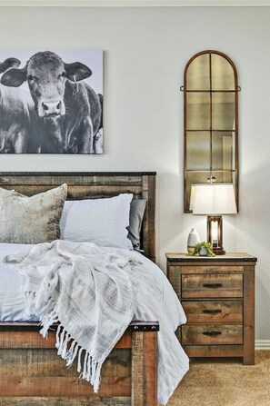 The primary bedroom is beautiful and comfortable