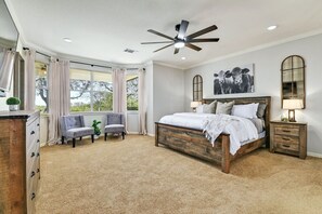 The primary bedroom is very large and very comfortable!  You can nestle up and watch your favorite streaming show from the Smart TV!
