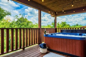 After a long day, go for a dip in the hot tub and take in the mountain views