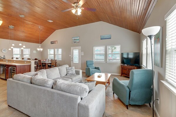 Living Area - The kitchen, dining, and living areas blend seamlessly for a bright and airy feel