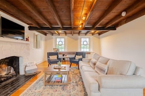 Enjoy the comfortable seating options in the living space.