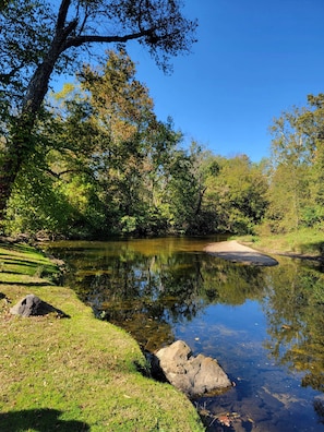 Bring out the fishing poles or sit back on a picnic blanket on the banks of the creek for a tranquil outdoor experience.