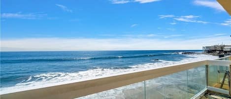 Outdoor balcony overlooking the ocean.