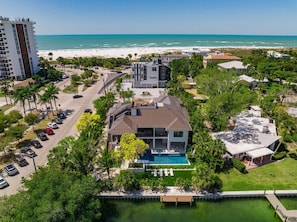Aerial View of Home, Pool, Bayou and Dock, and the View