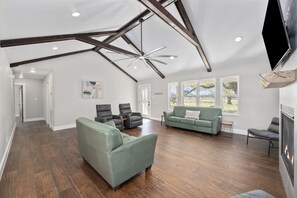 living room in main house, down the hall to the bedrooms & bathrooms