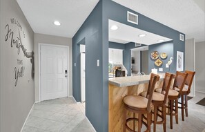 Have great conversations while chef is preparing a meal . Bar seats 4
