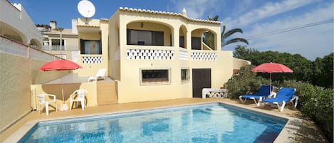 Private pool with sun loungers on the terrace