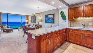 Open concept luxury condo has dynamic views from every room and oceanfront lanai