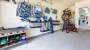 Garage stocked with beach gear and bikes