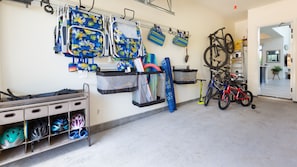 Garage stocked with beach gear and bikes