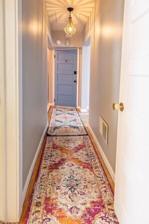 Hallway to bathroom and bedroom