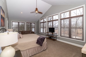 Master Bedroom- King bed, fold flat futon couch, small fridge and coffee bar.