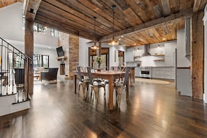 Open kitchen, dining, and living area.