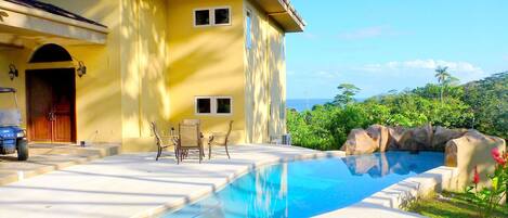 Facade / entrance,Pool view,Swimming pool