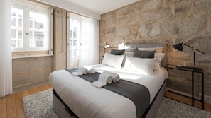 For a warm night, the bedroom comes with a comfortable bed and cozy linen and for a fresh day it provides you with an AC #airbnb #airbnbporto #portugal #pt #porto