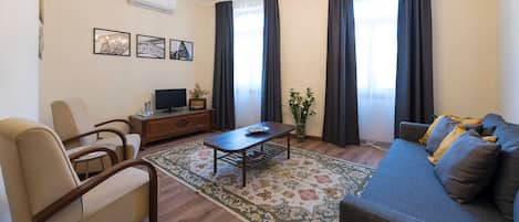 Spacious living room with sofa-bed and AC #airbnb #airbnbporto #portugal #pt #porto #cozy