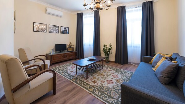 Spacious living room with sofa-bed and AC #airbnb #airbnbporto #portugal #pt #porto #cozy