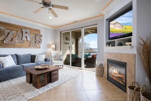 Our Land's End unit has an open floor plan from the kitchen to the living room with beautiful views of the main channel. TV's with free Wifi are in each bedroom and a tranquil electric fireplace makes this your home away from home.