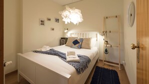 The second bedroom, also with a unique and stylish decor, holds a soft bed and cozy linen #airbnb #airbnbporto #portugal #pt #porto