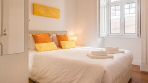 Bright bedroom with a double size bed and cozy linen #airbnb #airbnblisbon #portugal #pt #lisbon