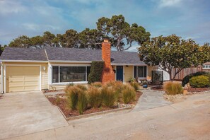 Our house with driveway and street parking