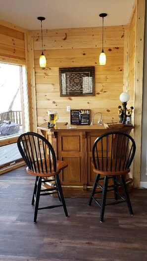 Bar with sink behind 