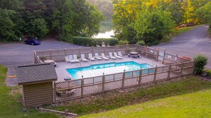 Seasonal community swimming pool ~1min drive from cabin.