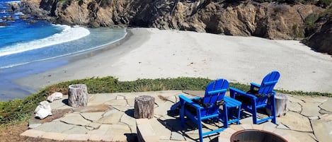 Fire pit & chairs to take in the spectacular view & passing whales!