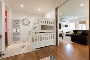 Bunk beds in alternate sleeping area. Double lower bunk, single top bunk.
