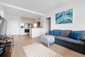 Open plan Lounge room with double sofa bed.