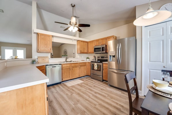 Large Kitchen - opens to living area - eat in kitchen and also bar counter seating