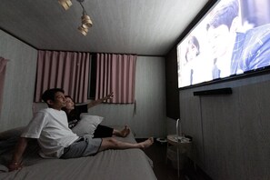 You can watch movies in both bedrooms