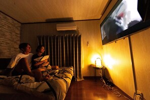 You can watch movies in both bedrooms