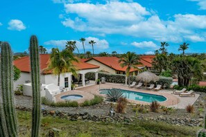Our expansive backyard features a private pool and hot tub, offering a perfect blend of space and luxury for relaxation and fun.