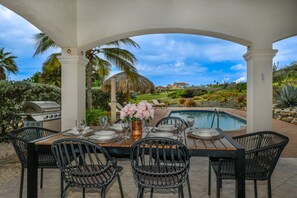 Outside dining table for meals by the pool