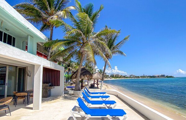 Private Beachfront Patio with Sunloungers