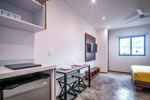 Modern kitchen with dining area, perfect for entertaining guests