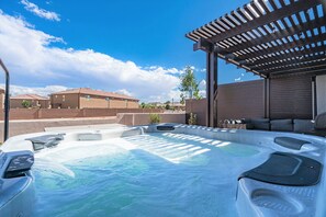 Private hot tub on back patio of house #51