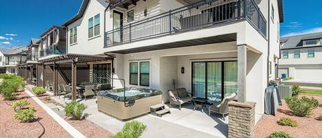 Gorgeous covered upper deck and lower patio with hot tub