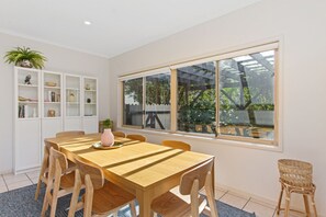 Enjoy a family lunch in the natural light of the dining room