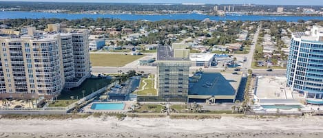 Oceanfront - the unit has a door leading out to the grassy area in the photo