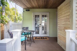 Enter through two gates and once you get to the Banyan tree you will take a left at this welcoming patio. This secret entrance is your way into the cabana.