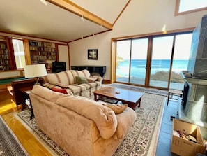 Living area with piano and library